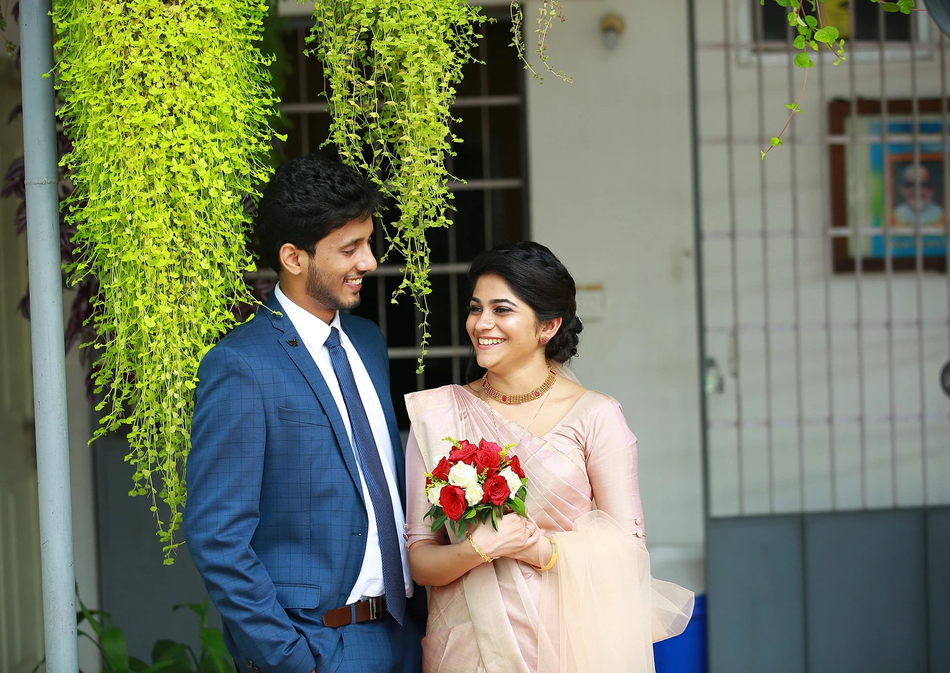 A couple laughing together at their engagement
